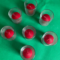 7 Red Candles with Glass Holders